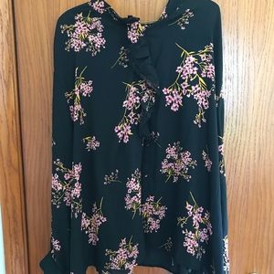 Plus size long sleeve floral blouse.